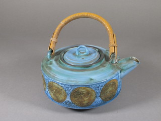 A circular Troika blue glazed teapot, base marked Troika St Ives England and B cypher 7"  ILLUSTRATED