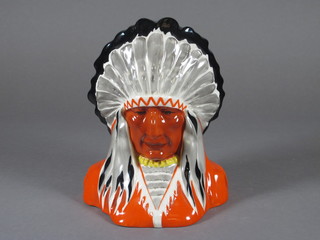 A Czechoslovakian pottery figure in the form of a head and shoulders bust of a Red Indian Chief 7"