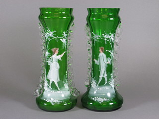 A pair of green glass Mary Gregory style vases 11"