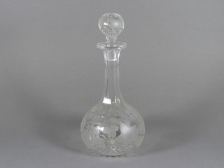 An etched glass club shaped decanter and stopper 11"