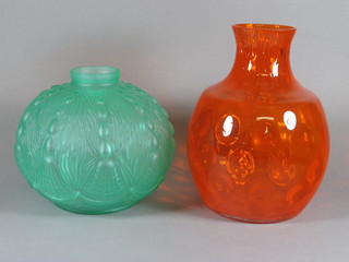 An amber Art Glass vase 10" and a green Art Glass vase 8"
