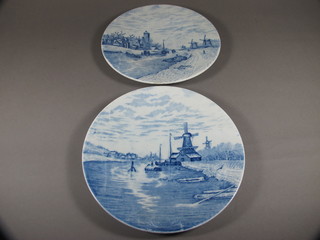 A pair of Continental porcelain blue and white plates decorated windmills 10"