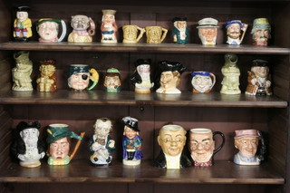 26 various pottery Toby jugs