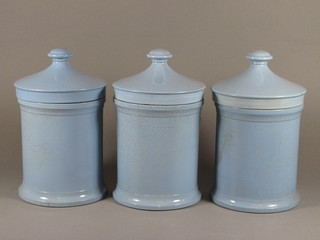 3 cylindrical blue glazed chemists jars and covers 8"