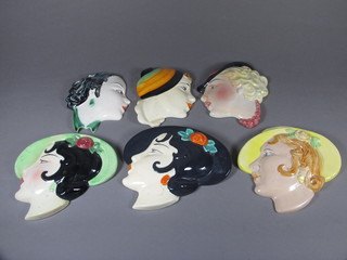 A Czechoslovakian Art Deco style pottery wall mask in the form  of a lady's head and 5 others