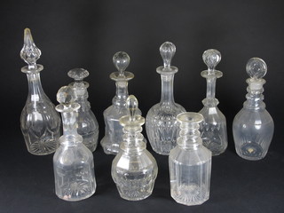 9 various decanters and stoppers