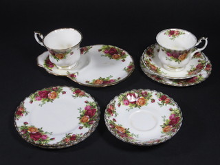 A 9 piece Royal Albert Old Country Rose pattern tea service  comprising 3 plates 6 1/2", 3 saucers and 2 cups - 1 chipped to  base and 1 saucer