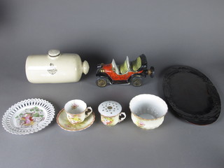 A Royal Doulton stoneware hotwater bottle, 4 Victorian ribbonware plates, a part floral patterned tea service, an Italian  pottery flask in the form of a vintage car, an Eastern hardwood  tray and a print of Hastings