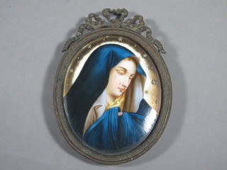 A porcelain enamelled plaque "The Virgin Mary" contained in a  gilt mount 3", oval,