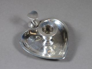 A silver heart shaped chamber stick, Sheffield 1910, 2 ozs   ILLUSTRATED
