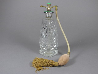 An Art Deco cut glass perfume atomiser with green enamel and  white metal collar 8"