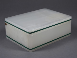 A Betjeman's rectangular onyx cigarette box with hinged lid 5  1/2"