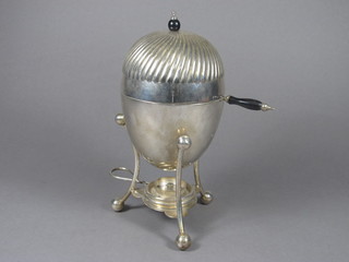 A silver plated egg boiler complete with burner