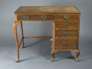 An Edwardian walnut typists desk fitted 1 long and 4 short drawers, raised on cabriole supports 36"w x 21"d x 29"h
