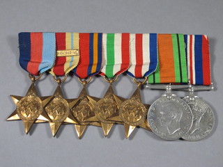 A group of 7 medals comprising 1939-45 Star, Africa Star with  bar North Africa 1942, Burma Star, Italy Star, France and  Germany Star, Defence and War medal