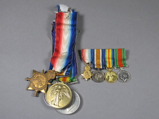 A group of 4 medals to Lieutenant later Captain Frank Lindner  Wington Middlesex Regt. comprising 1914-15 Star, British War  medal, Victory medal and Defence medal together with a set of  miniature medals