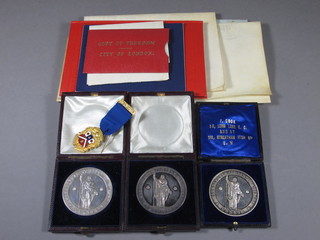 3 white metal presentation medallions from the Worshipful Company of Joiners and Ceilers, a gilt metal and enamel 400th  Anniversary jewel and various paperwork relating to the livery