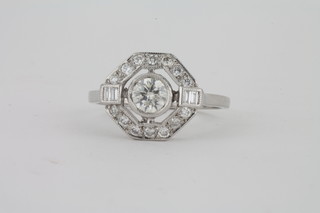 A lady's 18ct white gold Art Deco style dress ring set a central diamond surrounded by diamonds, approx 1ct
