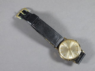 A gentleman's wristwatch by J W Benson contained in a gold  case