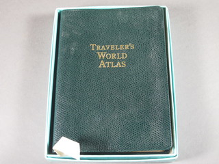 A Tiffany & Co. green leather bound traveller's World Atlas