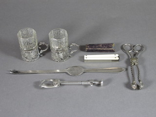 A pair of Continental pierced white metal cup holders with etched glasses and a collection of other curios