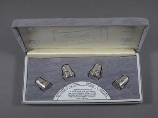 4 silver thimbles decorated the hallmarks of Birmingham,  London, Sheffield and Edinburgh, cased