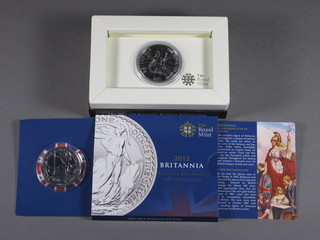 A 2011 Britannia silver proof one ounce coin and a do. 2012