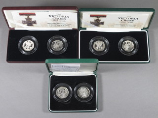 2 1998 silver proof 50 pence pieces together with 2 cased sets of 2006 silver proof 50 pence pieces