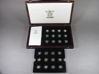 A 1998 limited edition set of 24 various Royal Mint fine gold miniature coins, cased