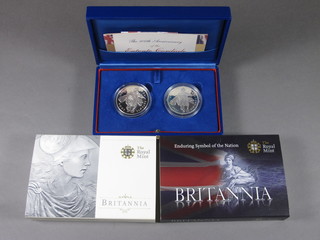2 boxed 2004 100th Anniversary of the Entent Cordiale together with 2 Britannia coins 2009 and 2010