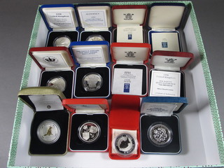 12 various silver proof crowns
