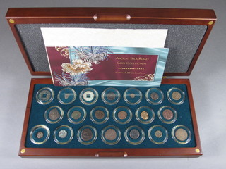 A 20 piece Ancient Silk Rhode coin collection, cased