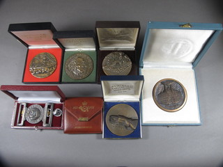 6 various Continental medallions, a reproduction Warwickshire  Regt. belt buckle and a reproduction Africa General Service  medal 1887-1879