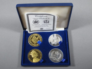 2 silver plated 1977 Silver Jubilee limited crowns and 2 do. gold plated Golden Jubilee crowns