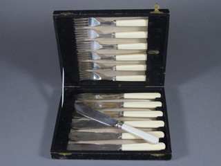 A set of 6 silver plated fish knives and forks with 1 extra fish  knife