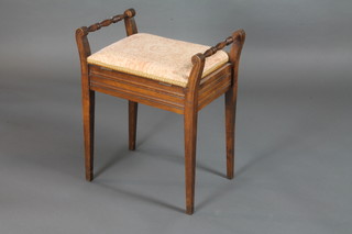 An Edwardian mahogany piano stool with hinged lid, on square  tapering supports 19"w x 13"d x 25"h