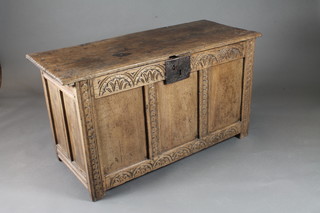 A 18th/18th Century oak coffer of panel construction with iron lock and hinged lid 45"w x 19"d x 25"h