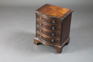 A Georgian style mahogany chest of serpentine outline and with  crossbanded top, fitted 4 long drawers, raised on bracket feet  16"w x 30 1/2"d x 20"h