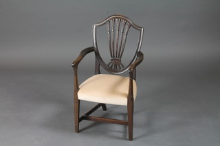 A childs Georgian style Hepplewhite open arm carver chair with upholstered seat, raised on square supports with H framed  stretcher