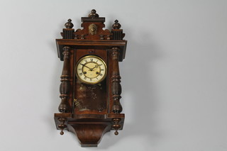 A Vienna style striking regulator with 5" paper dial with Roman numerals, contained in a walnut case