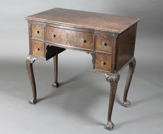 A Chippendale style bow front mahogany side table fitted 1 long  and 4 short drawers, heavily carved, raised on cabriole supports  31"w x 19"d x 31"h