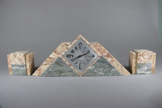 A French Art Deco 3 piece clock garniture comprising a mantel clock with diamond shaped dial contained in a pyramid shaped  case with 2 side pieces