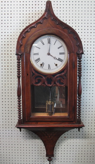 A 19th Century Continental striking wall clock with 9" dial and Roman numerals contained in a mahogany case