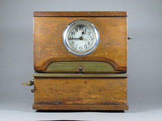 A clocking in clock with 4 1/2" silvered dial and Arabic  numerals contained in a mahogany case