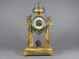 A 19th Century French 8 day striking Portico clock with  enamelled dial and Roman numerals contained in a brown marble  case surmounted by a lidded urn  ILLUSTRATED