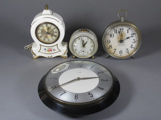 An Ingasol alarm clock in an chrome case, 1 other alarm clock, a Smiths battery operated clock in a porcelain case and a Metamec  wall clock
