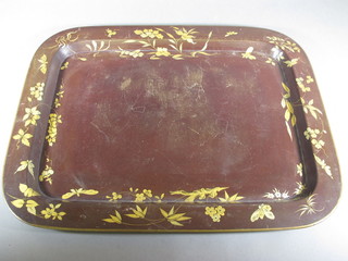 A 19th Century rectangular brown lacquered floral patterned tea  tray, the reverse marked S & J Woolley Piccadilly, 21"