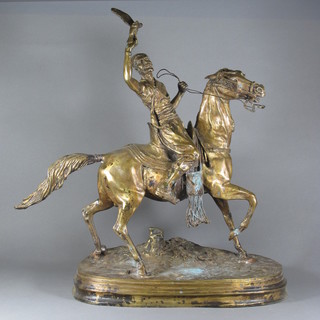 A gilt spelter figure of an Arab horseman with hawk, f,   ILLUSTRATED