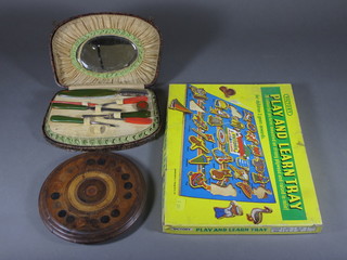 An Art Deco manicure set, a Victory Puzzle Play and Learn tray  and a wooden teapot stand