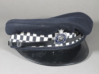 A Metropolitan Police peaked cap